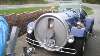 Illustration for article titled Grab a cold one with this custom beer can car